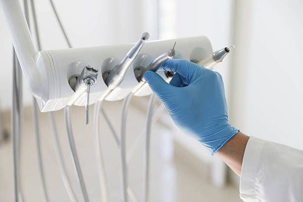 Professional Tooth Extraction technician working in Cinco Ranch, TX